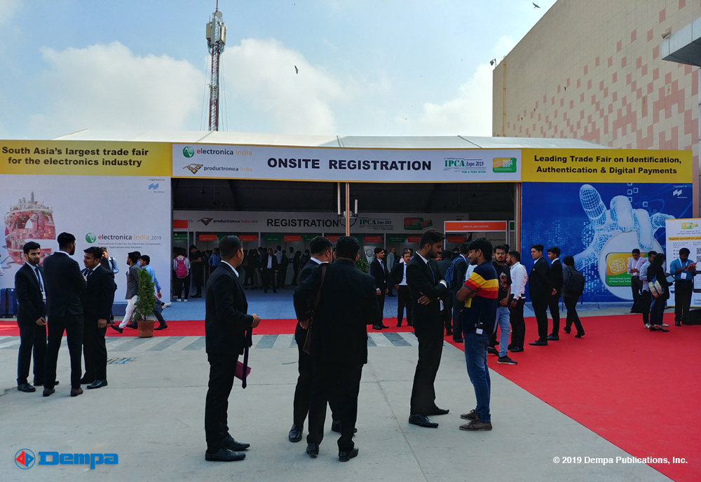 Visitors gather at the registration booth of electronica and productronica India 2019. 
